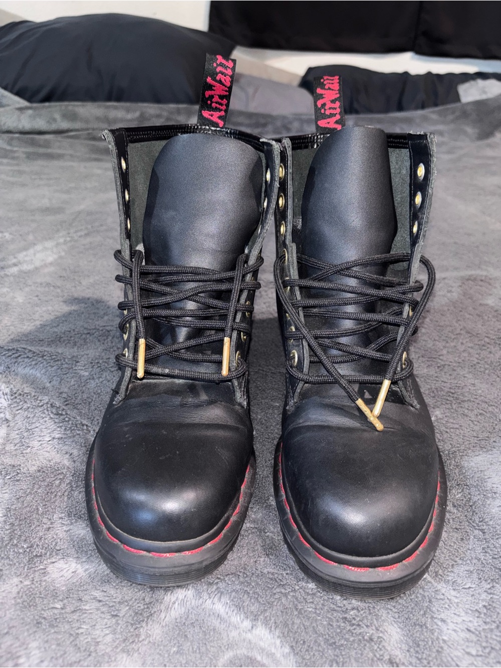 Dr. Martens Black Leather Combat Boots with Red Stitching